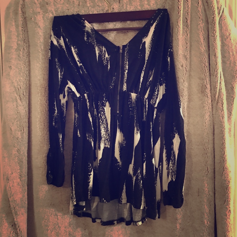 Black and white loose blouse, deep v-neck